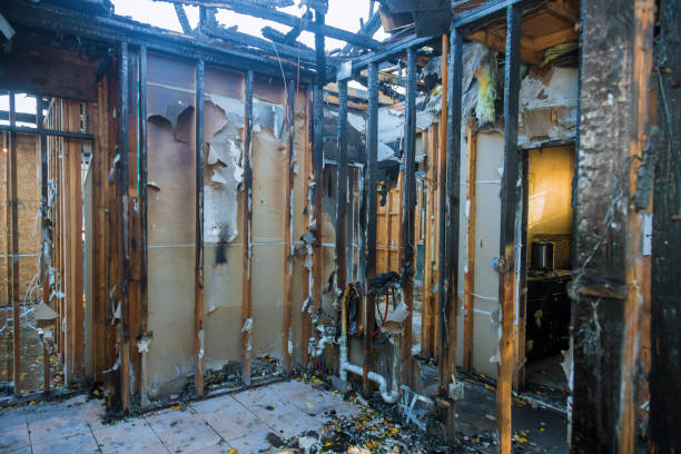 Professional Fire Damage Restoration technician working in Milford, PA